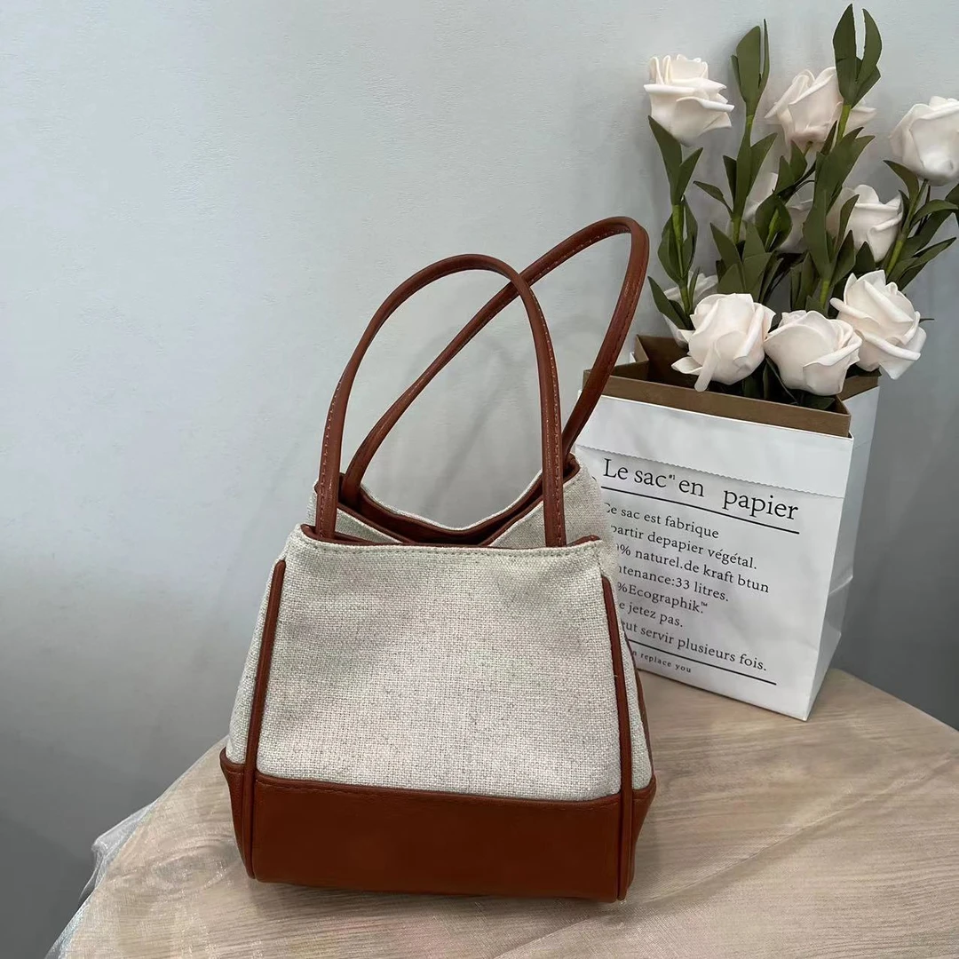2025新款春夏新中式帆布拼接牛皮时尚百搭复古托特包小众单肩女士
