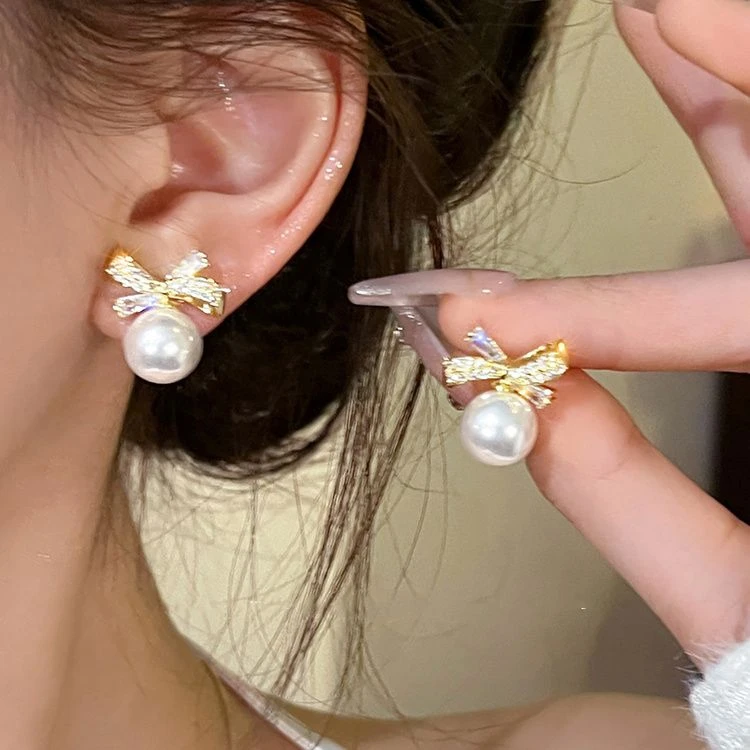 925银针蝴蝶结珠珠耳环2025年新款爆款高级感耳钉女小众独特耳饰