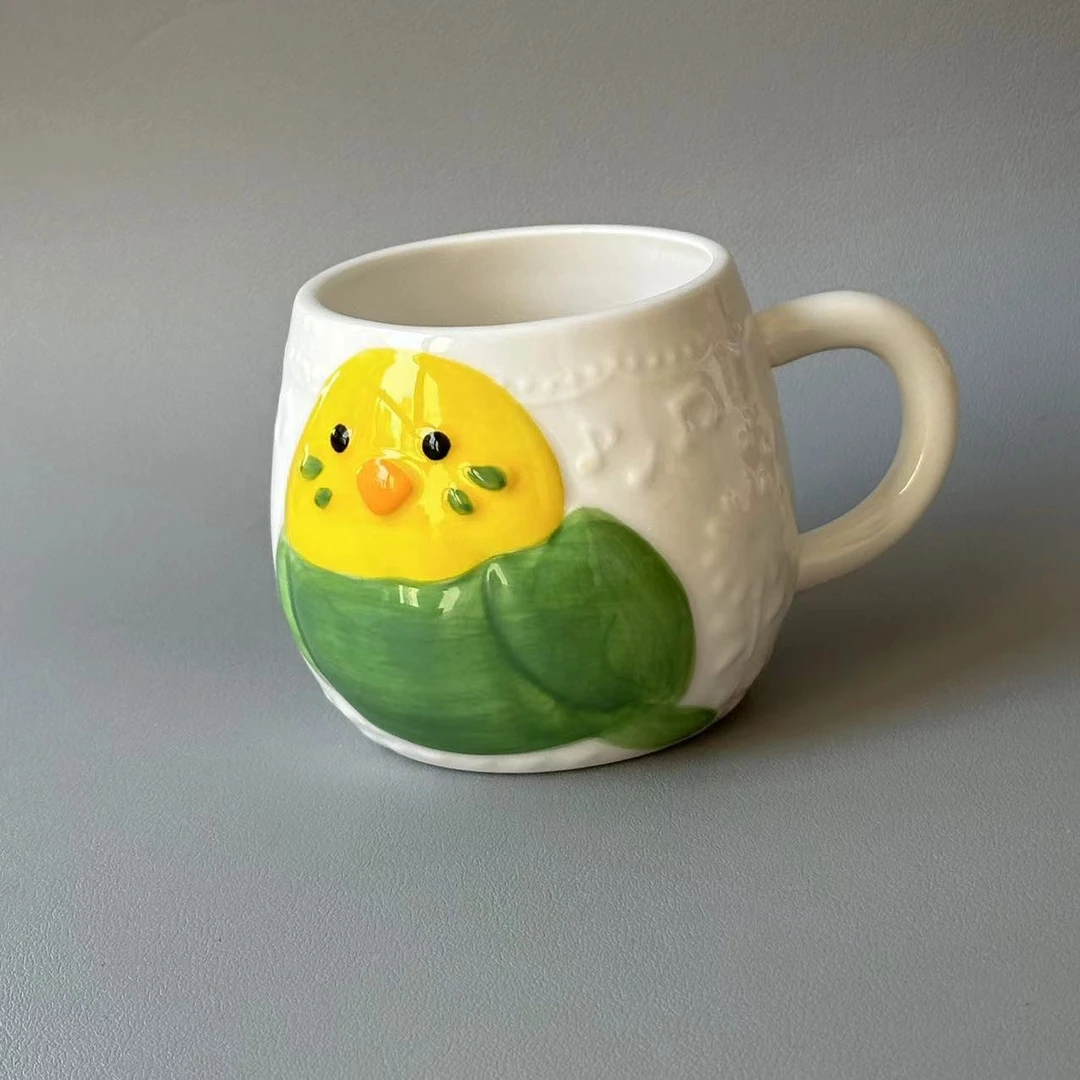 双色鹦鹉陶瓷浮雕杯1个