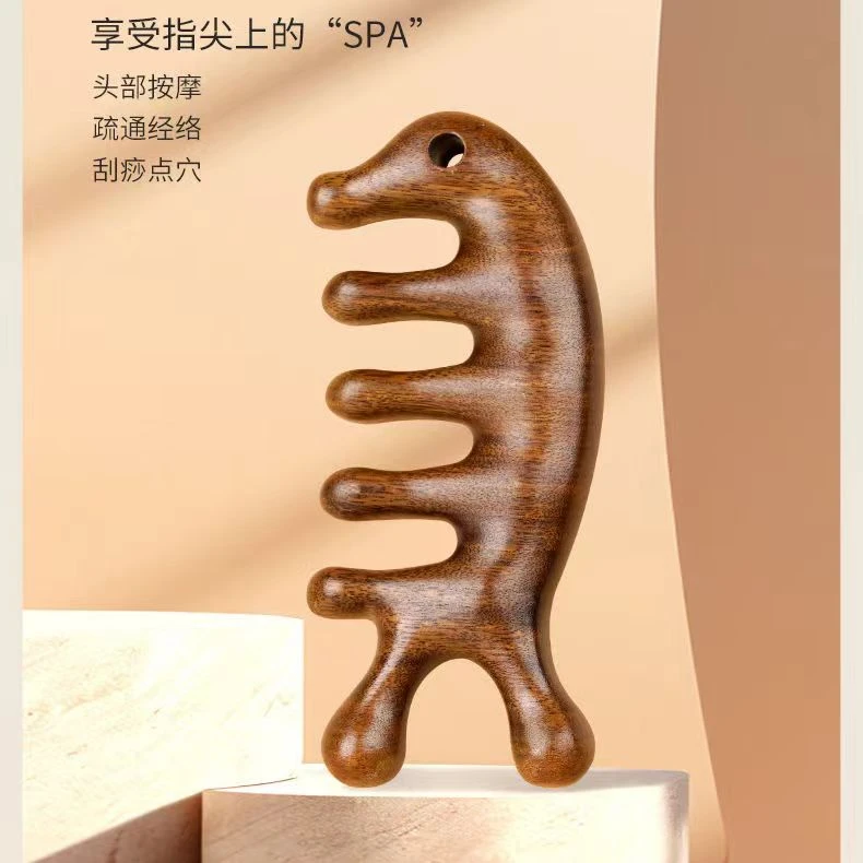 檀木海豚按摩梳 实木梳