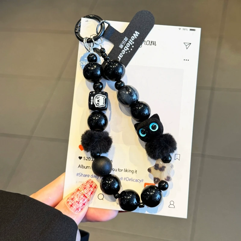 小众高级黑毛绒猫咪手机挂绳串珠手提链手腕带汽车钥匙扣包包挂件