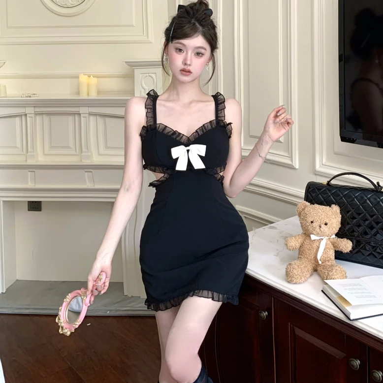 纯欲风蝴蝶结连衣裙女装春夏新款设计感露腰A字荷叶边包臀短裙子