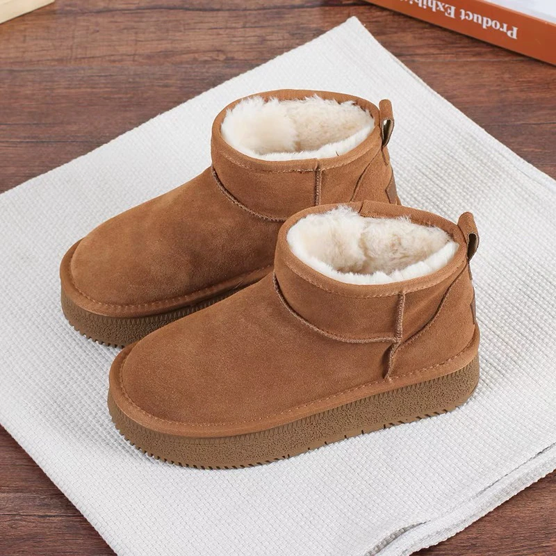 雪底靴女款25年女靴子平底防滑外穿休闲厚真皮短靴增高冬季雪地靴