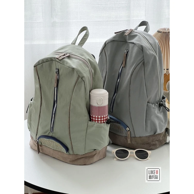 原创简约轻便刺绣双肩包日韩美式复古学院风学生通勤大容量书包