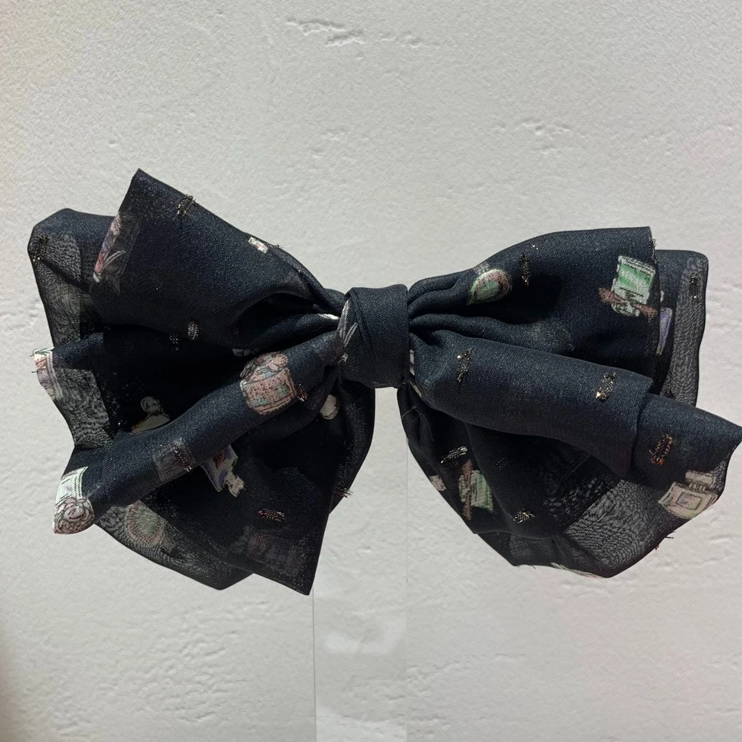GREBUTY 3916 新品黑色花花细闪蝴蝶结弹簧夹
