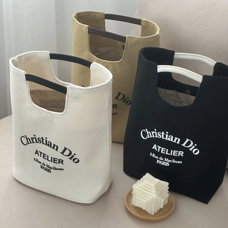 手拎外出文艺帆布袋上班化妆妈咪包学生饭盒袋休闲手提水桶便当包