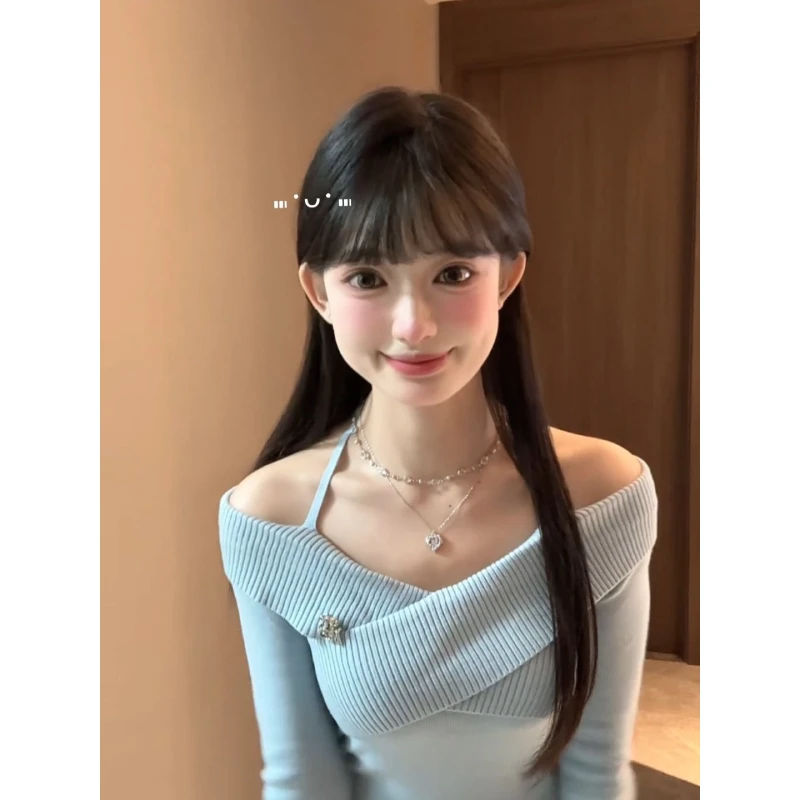 韩系蓝色一字肩挂脖针织衫女秋季设计感小众交叉修身显瘦短款上衣