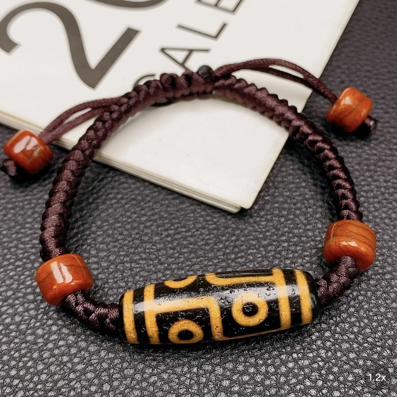 钙化牙黄六眼玛瑙手链珠珠尺寸38*13mm手工编织男女款长短可调节