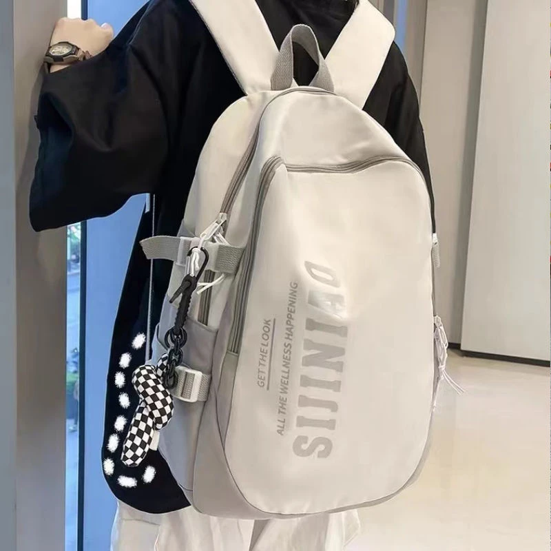高中生书包简约森系百搭高颜值耐脏小众冷门初中生女生外出双肩包