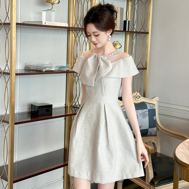 蝴蝶结连衣裙女夏2024新款法式设计感圆领初恋茶歇蓬蓬短裙30910