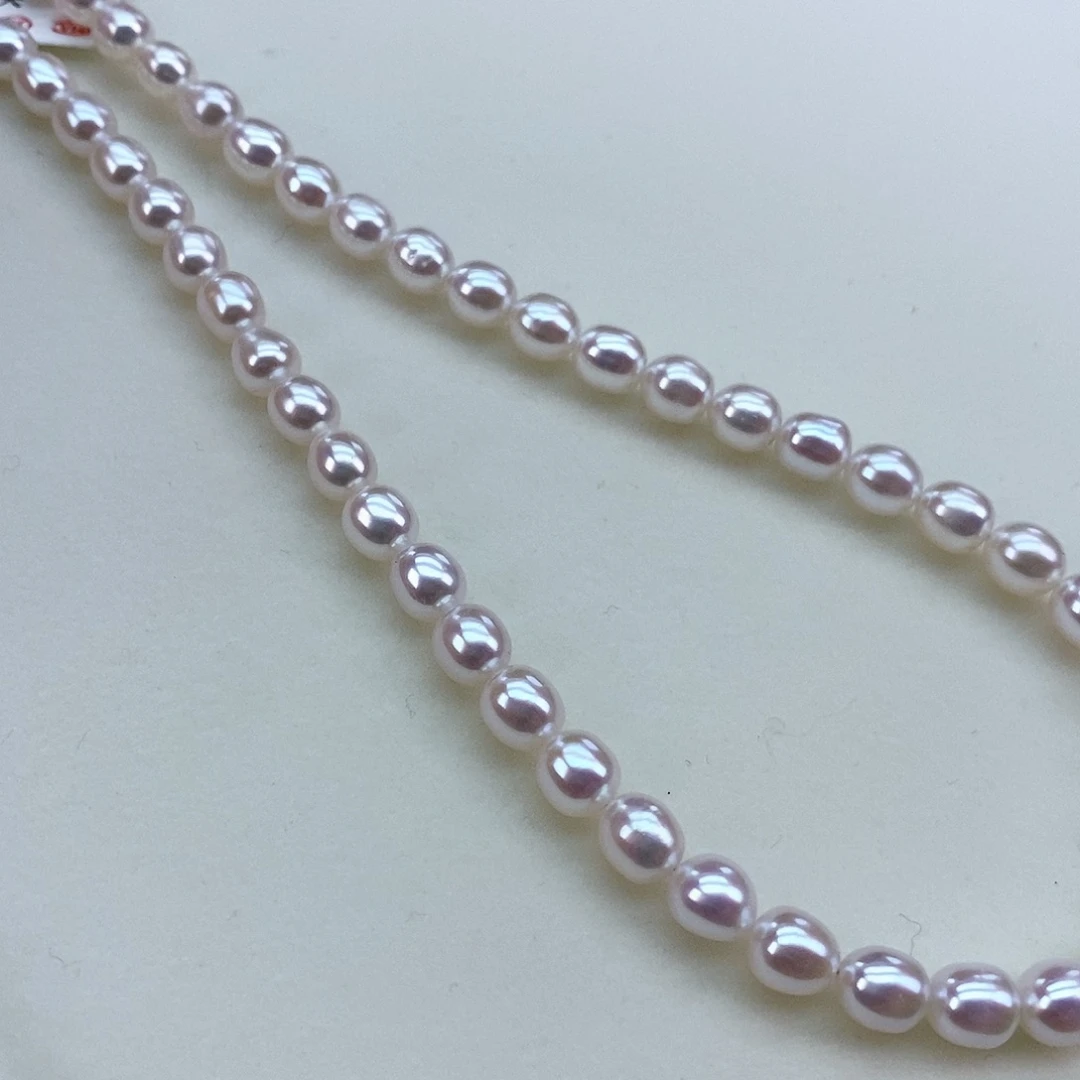 淡水珍珠5.5-6mm小胖墩炫彩粉超亮银S925镶嵌