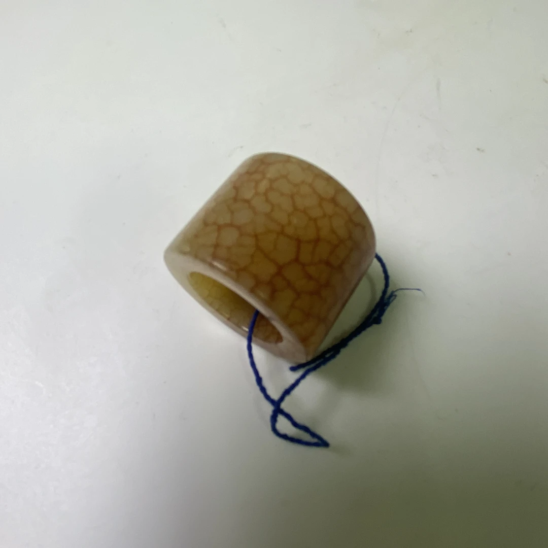 清代狗血沁黄玉扳指