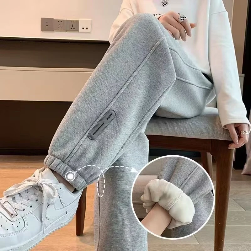 啄木鸟秋冬加绒哈伦裤百搭休闲卫裤新款运动裤女韩版宽松显瘦束脚