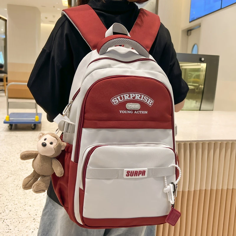 减负高中生潮流撞色双肩包女小学生初中高中书包男大学生旅行背包