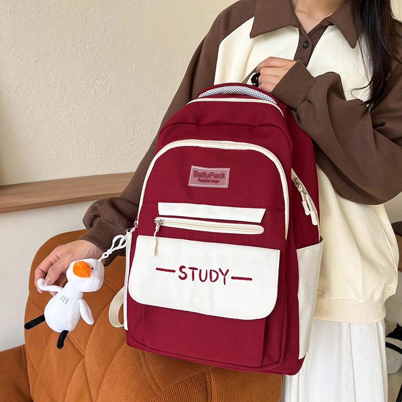 小清新尼龙双肩包女初中高中生撞色书包大学生简约百搭双肩背休闲
