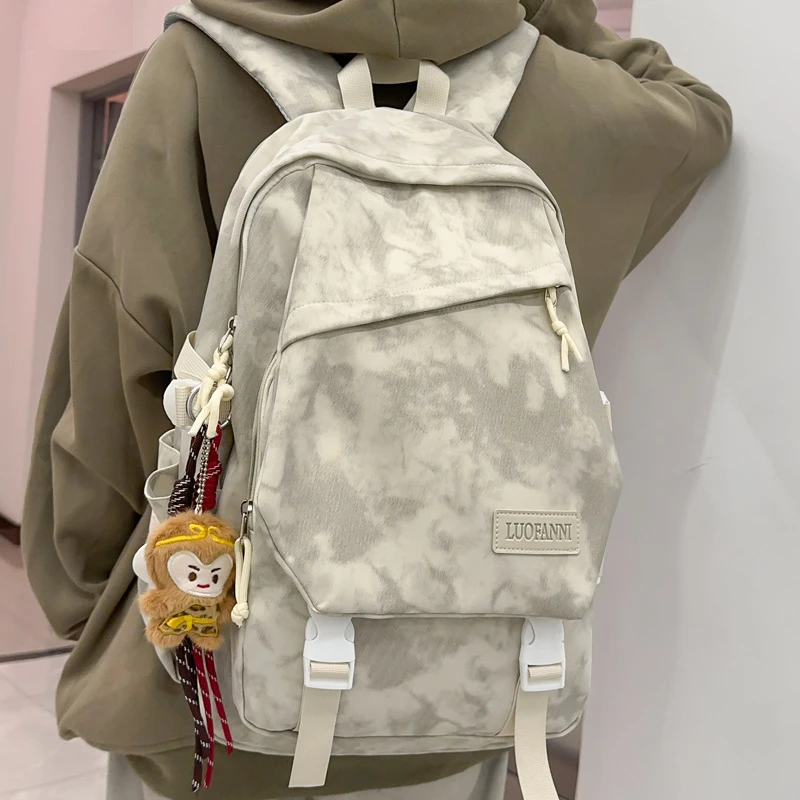 时尚暗纹双肩包女初高中生书包大学生轻便背包小学生4-6年级男ins