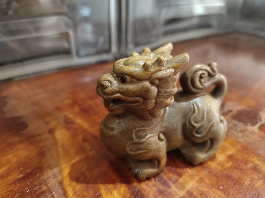 阿根廷绿檀木手把件麒麟款式