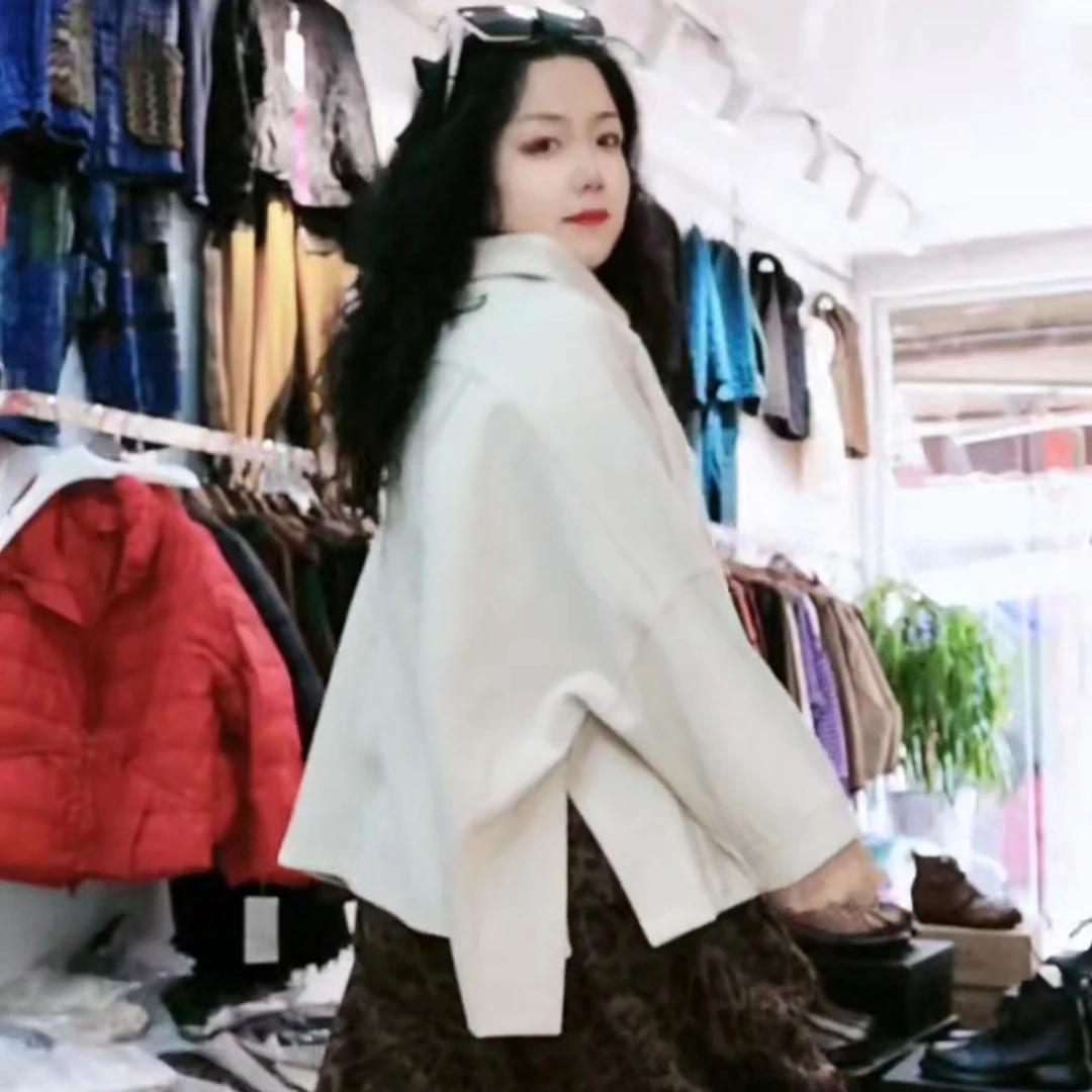 新春款休闲时尚侧开叉雪尔呢上衣