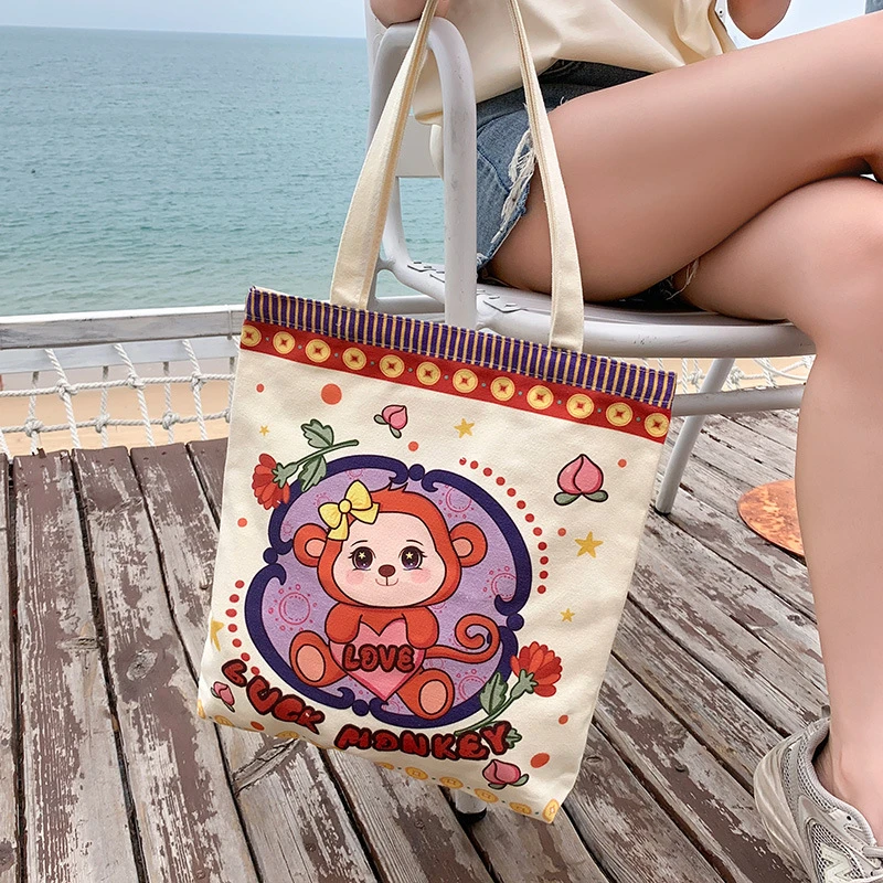 帆布包2024新款男女学生大容量补习袋网红单肩手提袋时尚布袋子