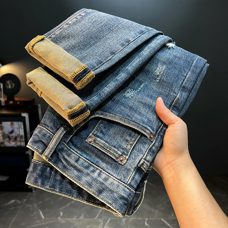 新款春季牛仔裤男刮烂设计感轻奢修身小脚百搭潮流简约长裤子A135