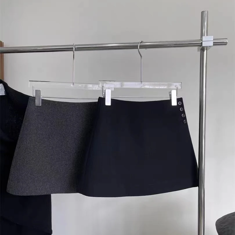 简约纽扣设计a字半身裙女2025新款秋冬季高腰显瘦包臀毛呢短裙子