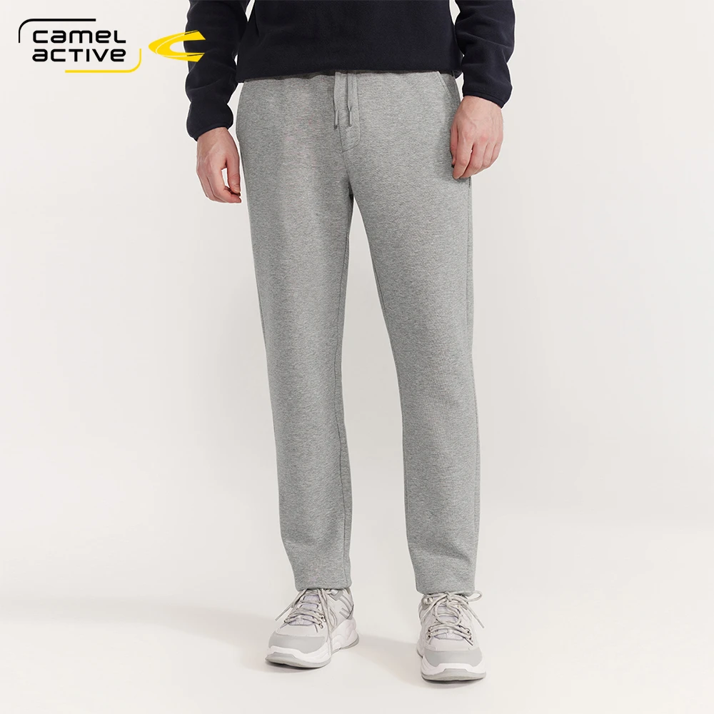 德国骆驼动感男装2025春季新款束脚卫裤宽松舒适休闲百搭抽绳卫裤