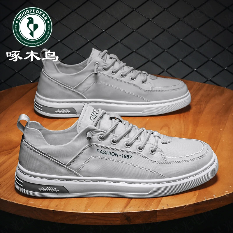 啄木鸟新款男鞋潮流百搭一脚蹬透气帆布鞋男款低帮软底轻薄休闲鞋