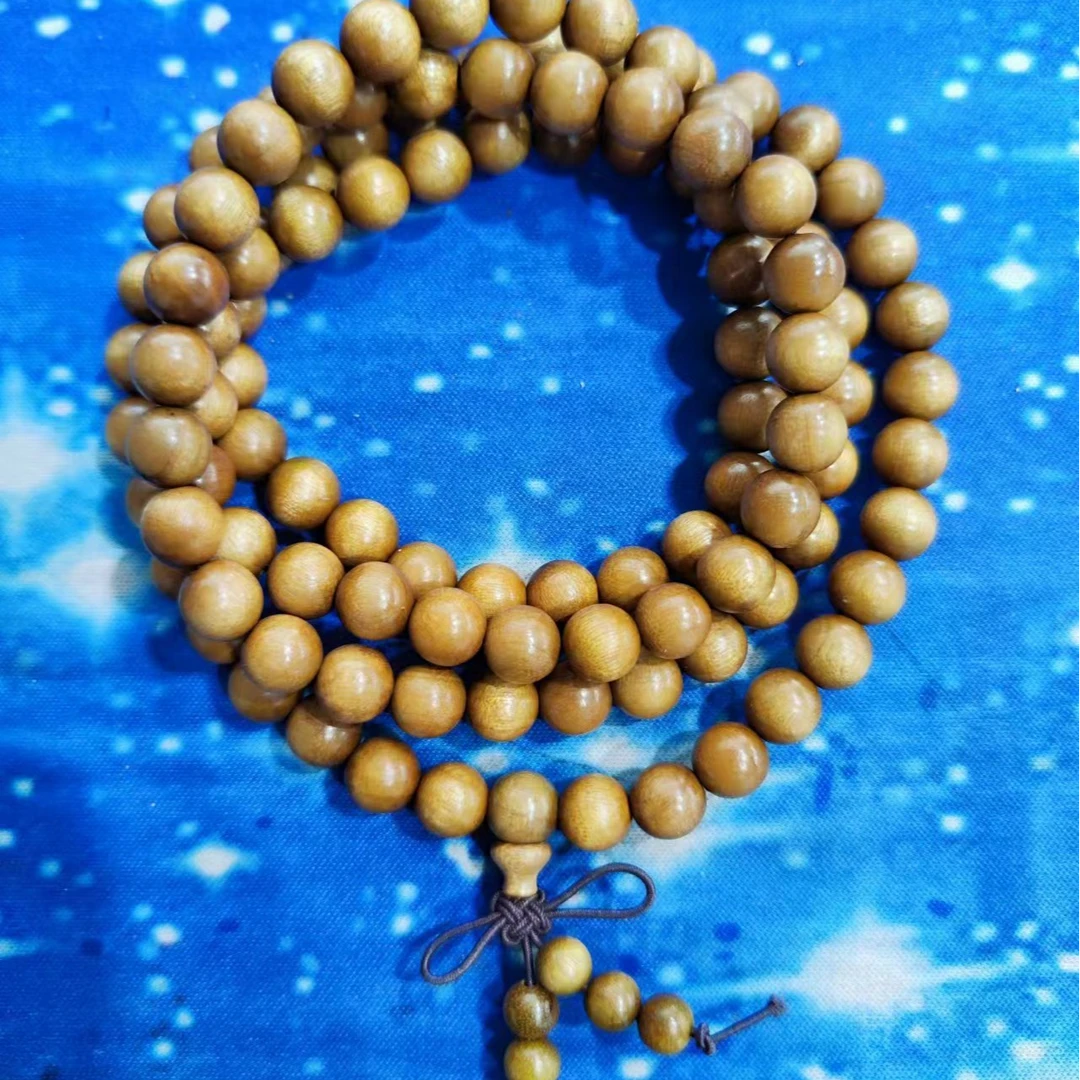 643号 金丝楠黄0.8cm长串