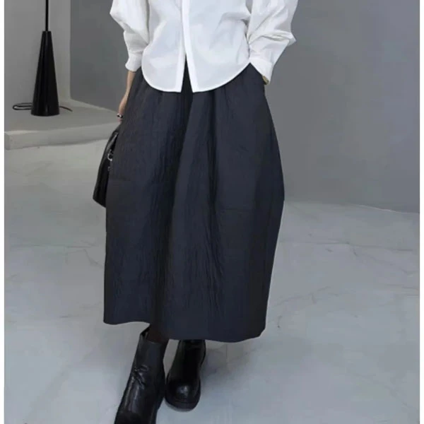 2024秋季设计时尚新款半身裙松紧肌理感压皱纯色休闲中长款花苞裙