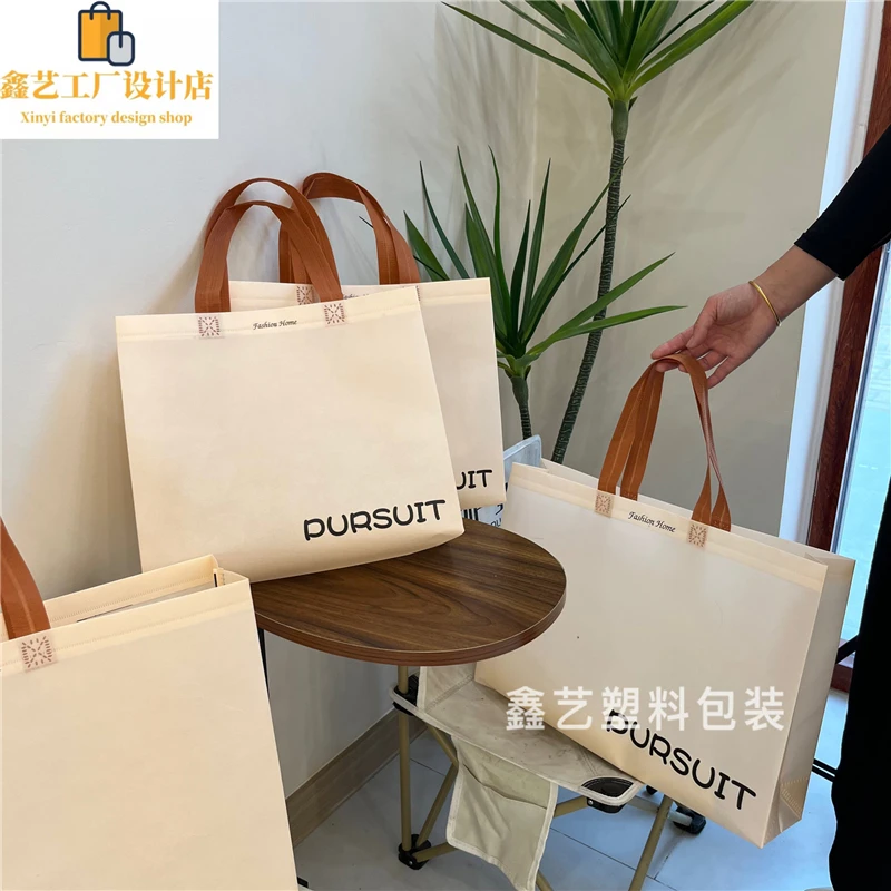 沙色英文覆膜无纺布袋子简约防水高档手提袋服装店袋子环保购物袋