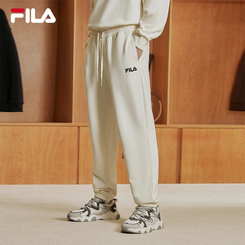 FILA 斐乐官方男子针织长裤2023秋季新款简约宽松运动休闲裤卫裤