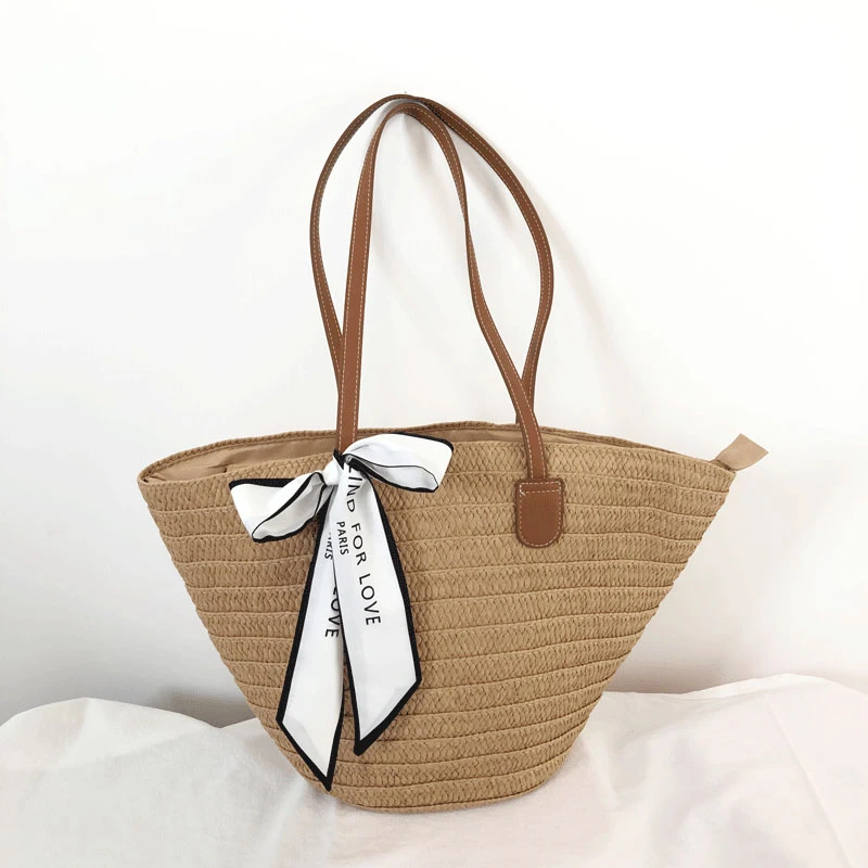 夏季新款草编包女休闲百搭单肩编织包包夏天海边度假水桶编织包