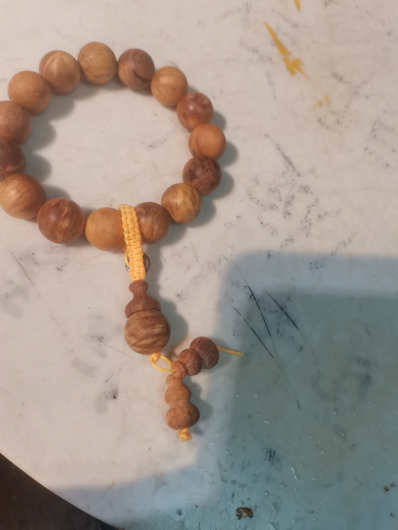 【二】北沉香琥珀木手把件