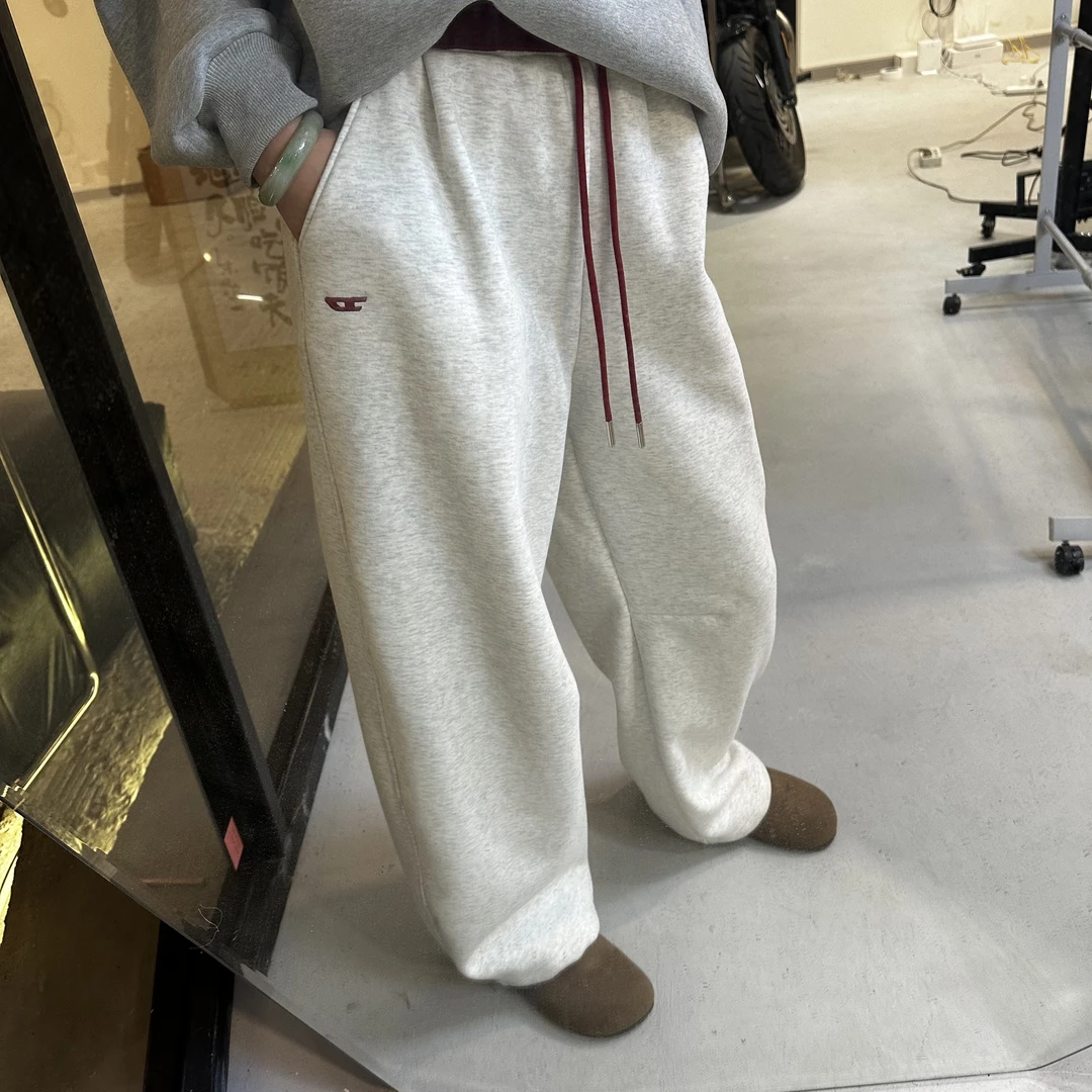 【现货】冬款加绒韩版拼接腰头刺绣弯刀裤24176