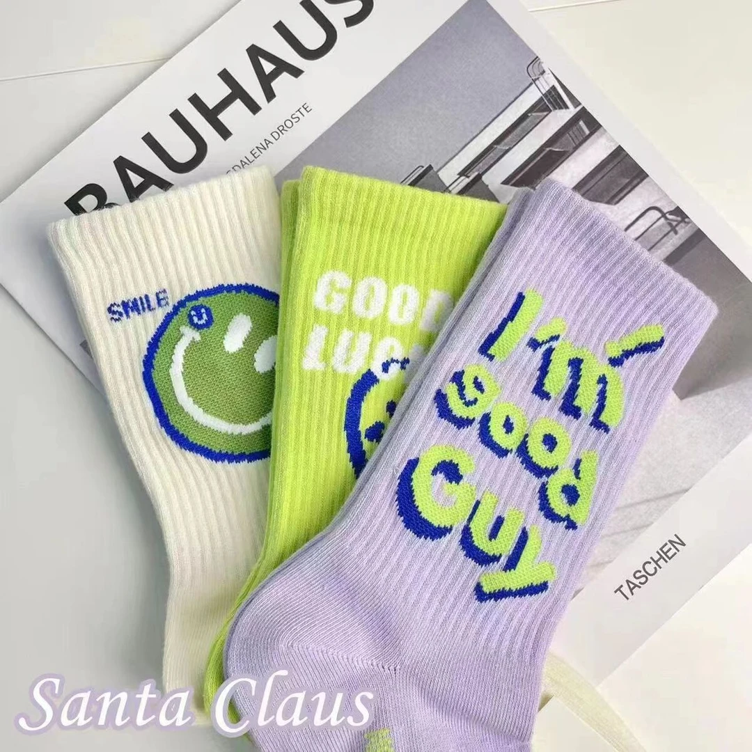 笑脸立体英文设计感荧光绿ins潮长筒袜子男女彩色百搭春秋中筒袜