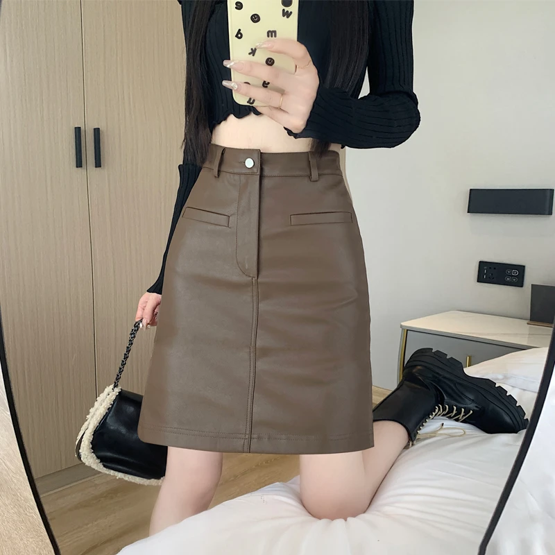 黑色PU皮裙显瘦半身裙女大码2023秋冬新款假口袋高腰a字短裙中裙