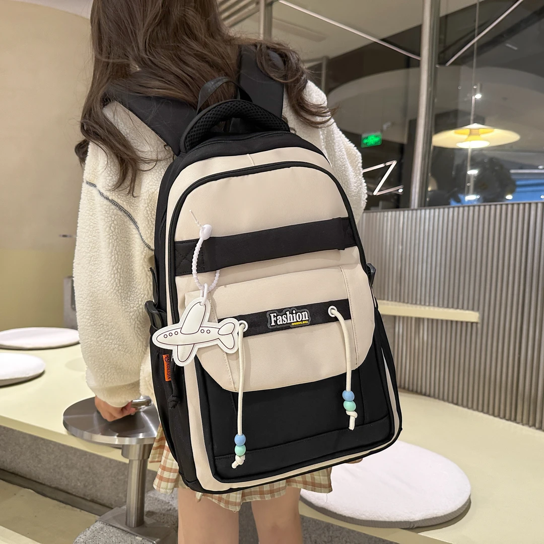 减负初中生女大容量高中学生轻便2024新款小学生五六年级防水背包