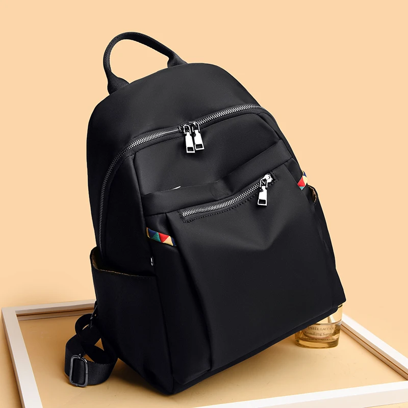 新款通勤防水面料休闲多功能双肩包大容量时尚百搭轻便旅行背包mu