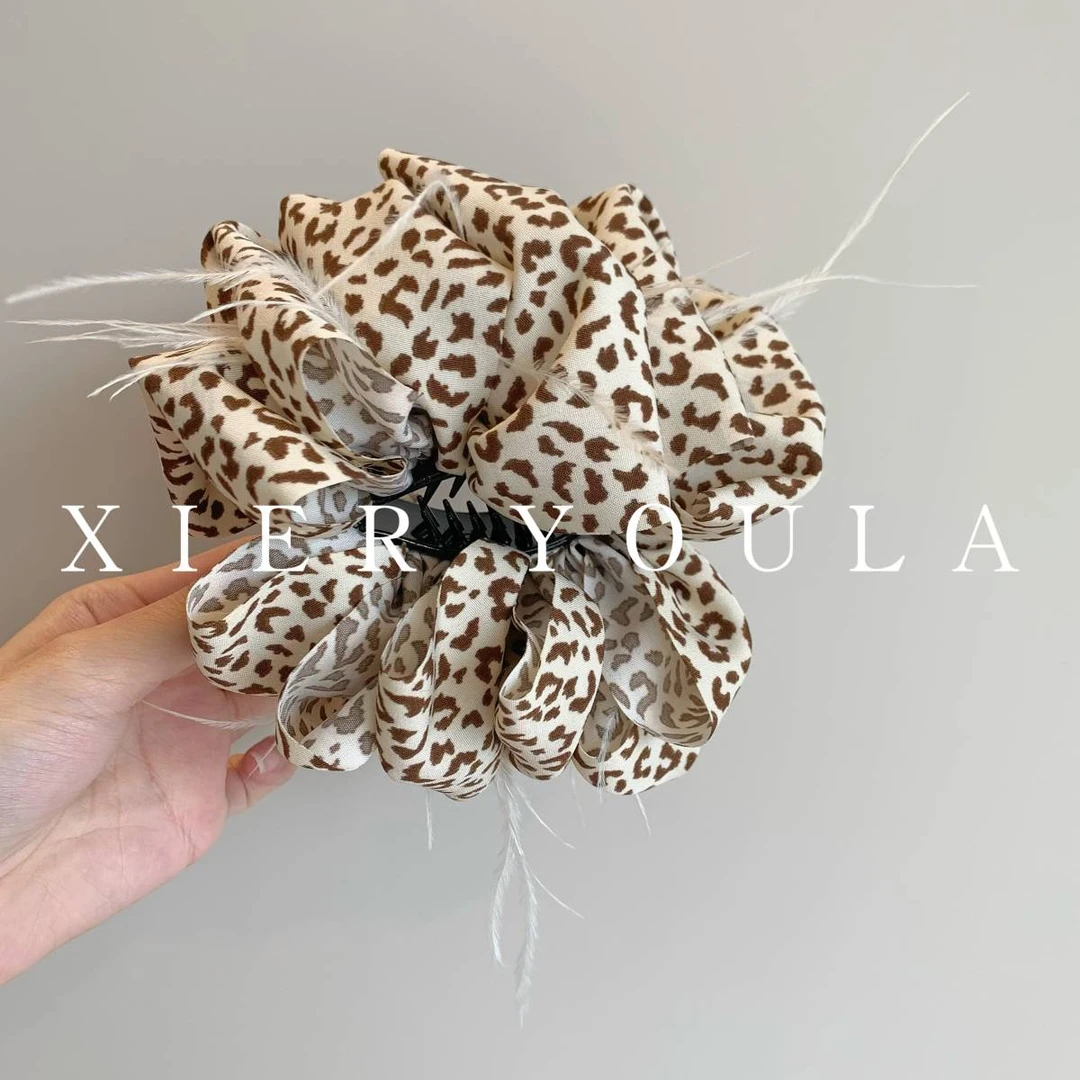 【喜儿ula】8-27-3法式轻奢羽毛复古波点斑纹时尚丸子头夹