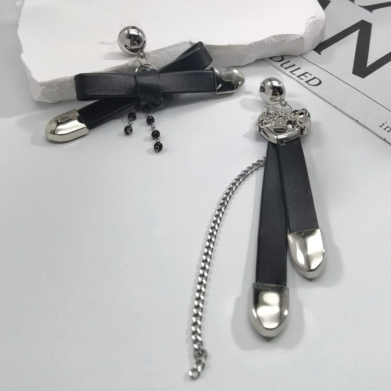 铜合金皮质耳饰 01919小众设计甜酷辣妹皮质蝴蝶结爱心流苏AB耳环