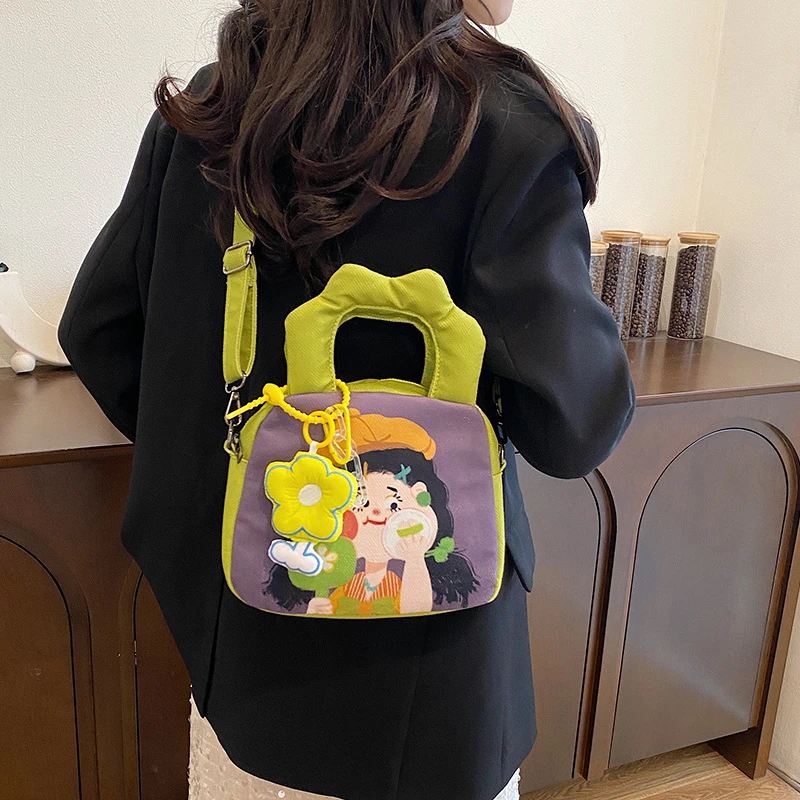 卡通可爱插画涂鸦水桶包包女小众设计女孩儿童个性手提包单肩斜挎