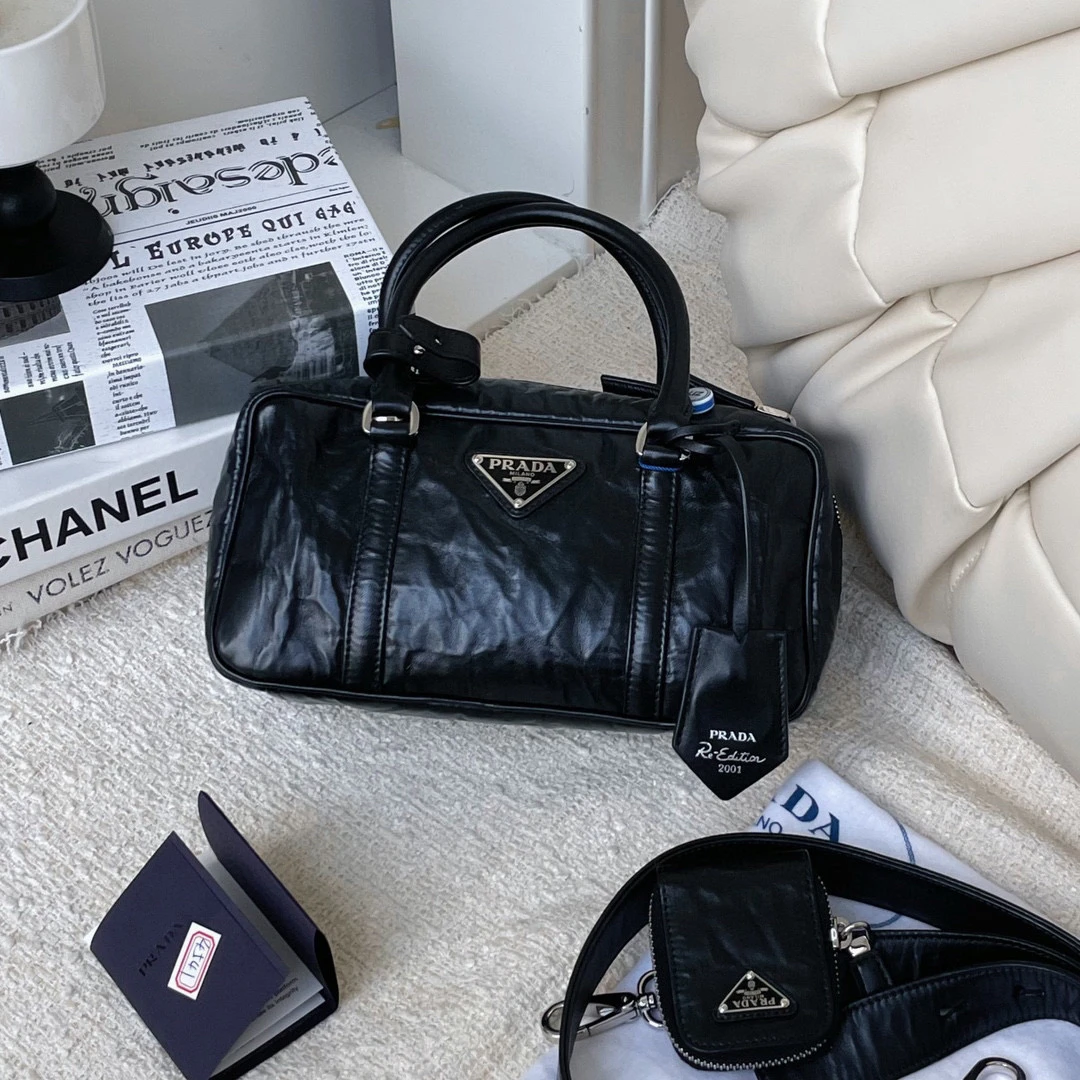 99新 Prada/普拉达 新款黑银保龄球尘袋中检工价32700 JM7-3105