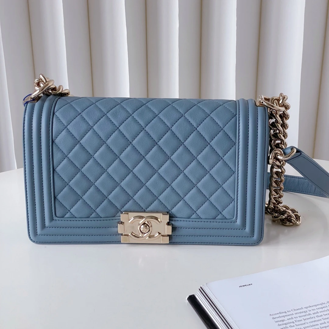 99新 Chanel/香奈儿 leboy中号牛皮蓝色金扣27开 JM7-2679