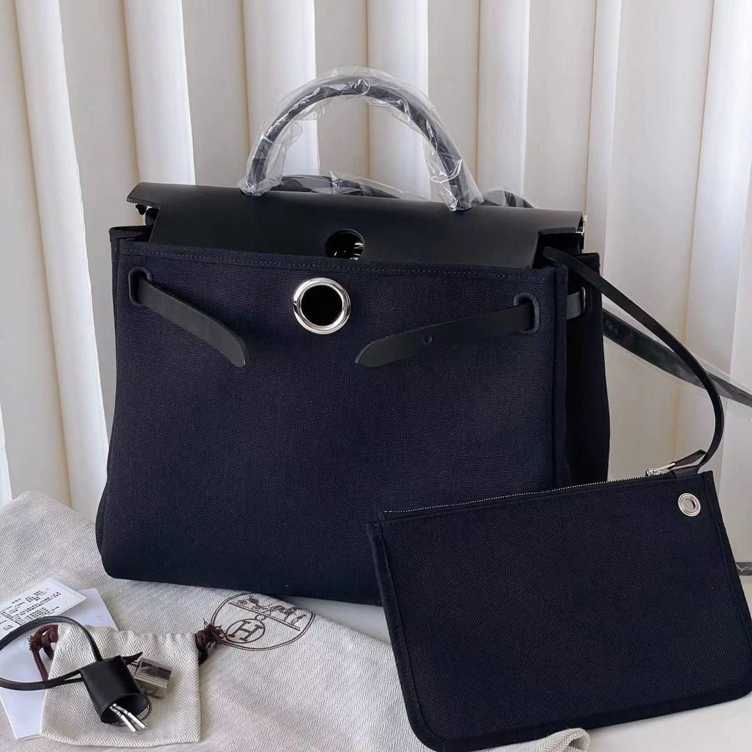 99新 Hermes/爱马仕 黑银herbag31 U刻 B8684