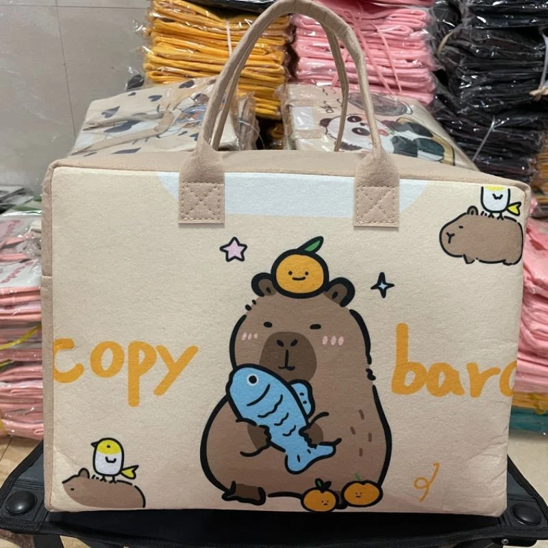 新款卡通旅行包可折叠大容量收纳袋毛毡行李包可套拉杆待产包E674