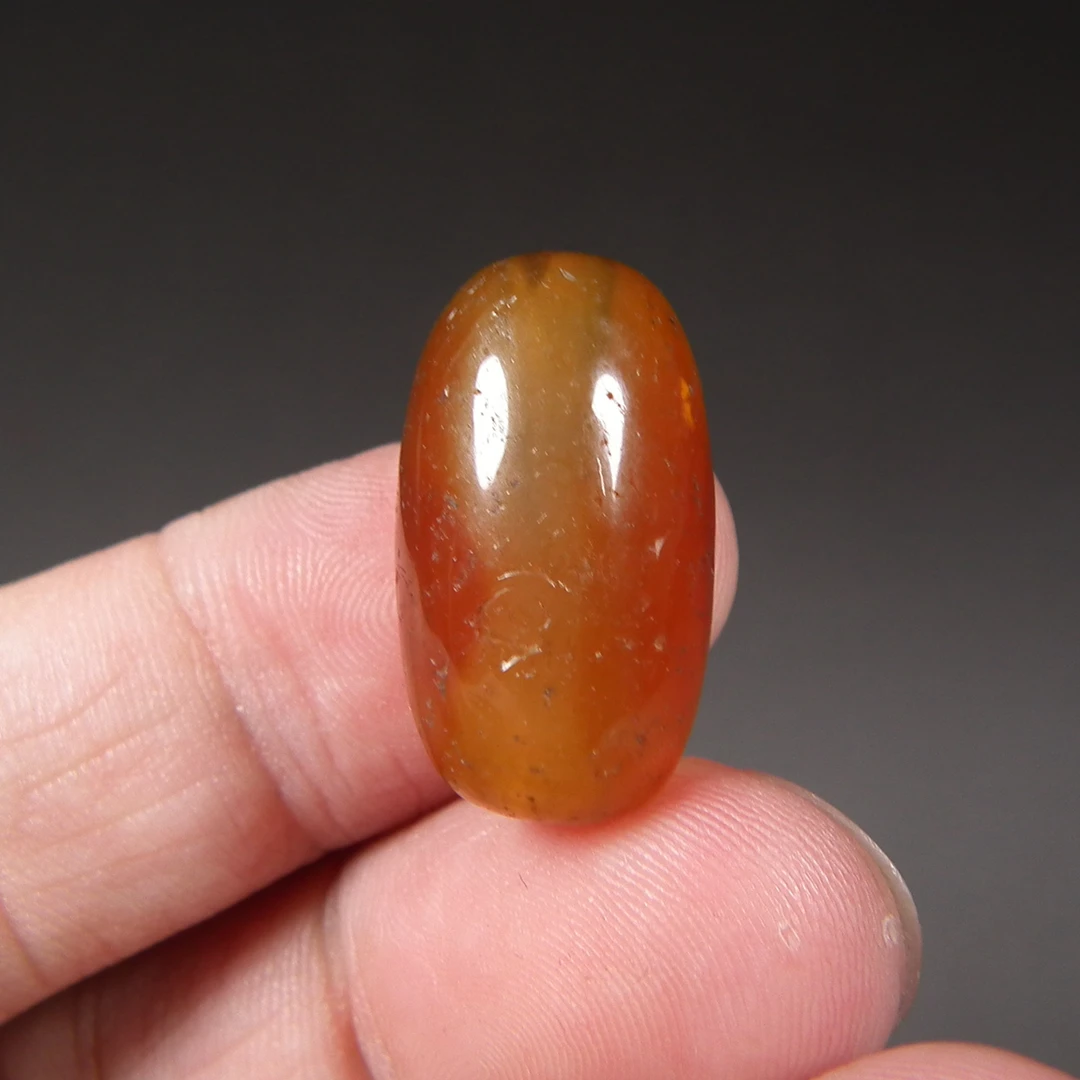 西亚几十年的柿子红缠丝玛瑙橄榄型中号管珠