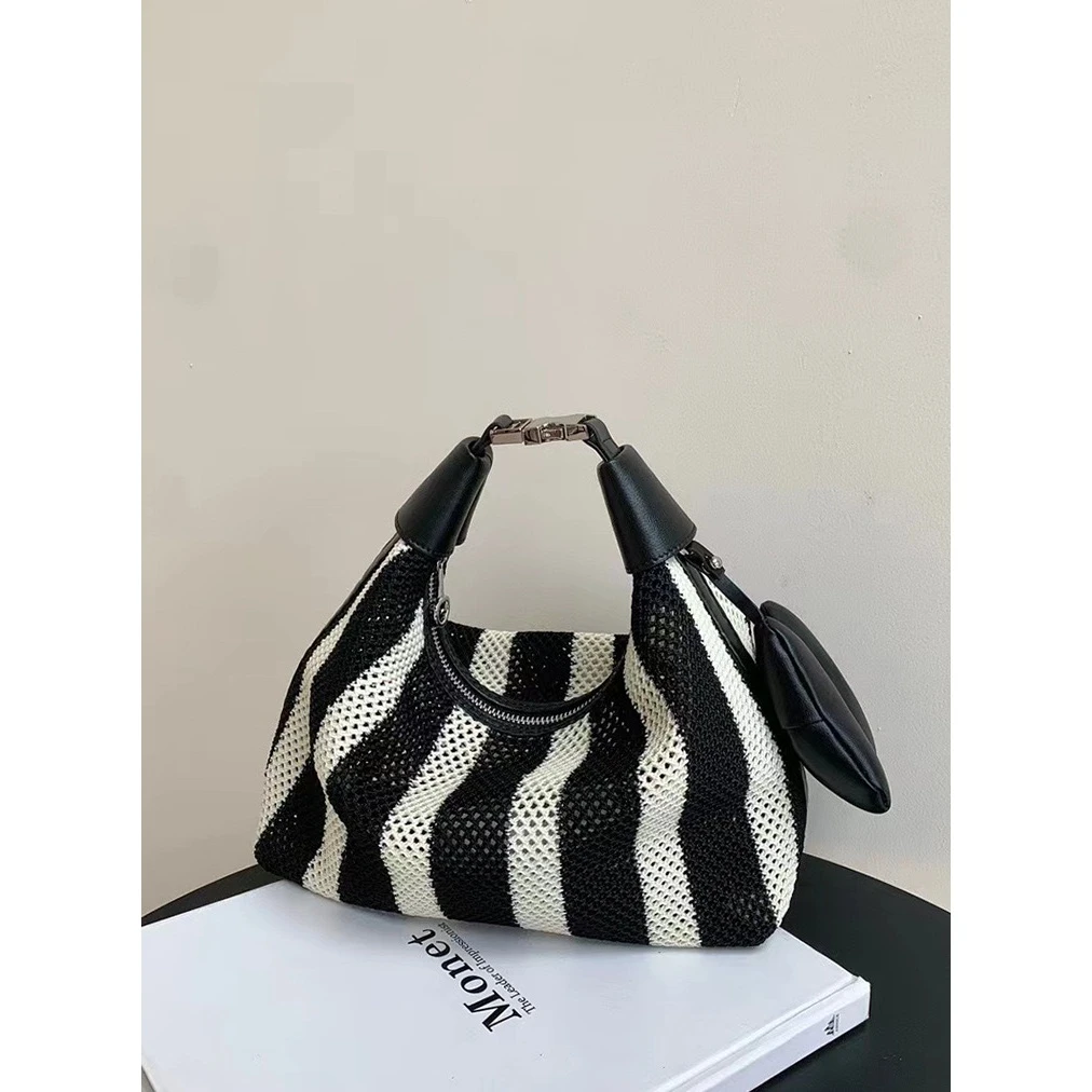 2024夏日新款镂空编织饺子包小众设计复古手提包饭盒包手拎斜挎包