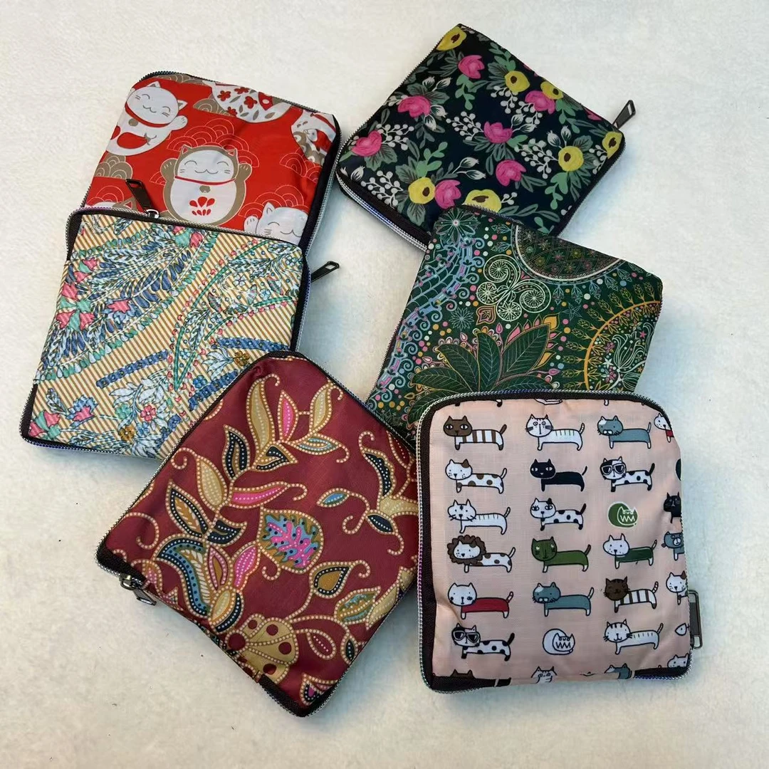 新款大容量时尚折叠收纳多口袋拉链防泼水购物收纳手拎包