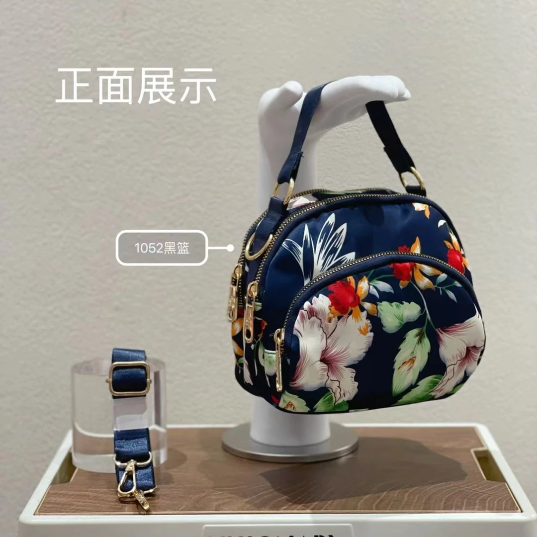 新款时尚百搭女生个性图案休闲拉链手拎斜挎包