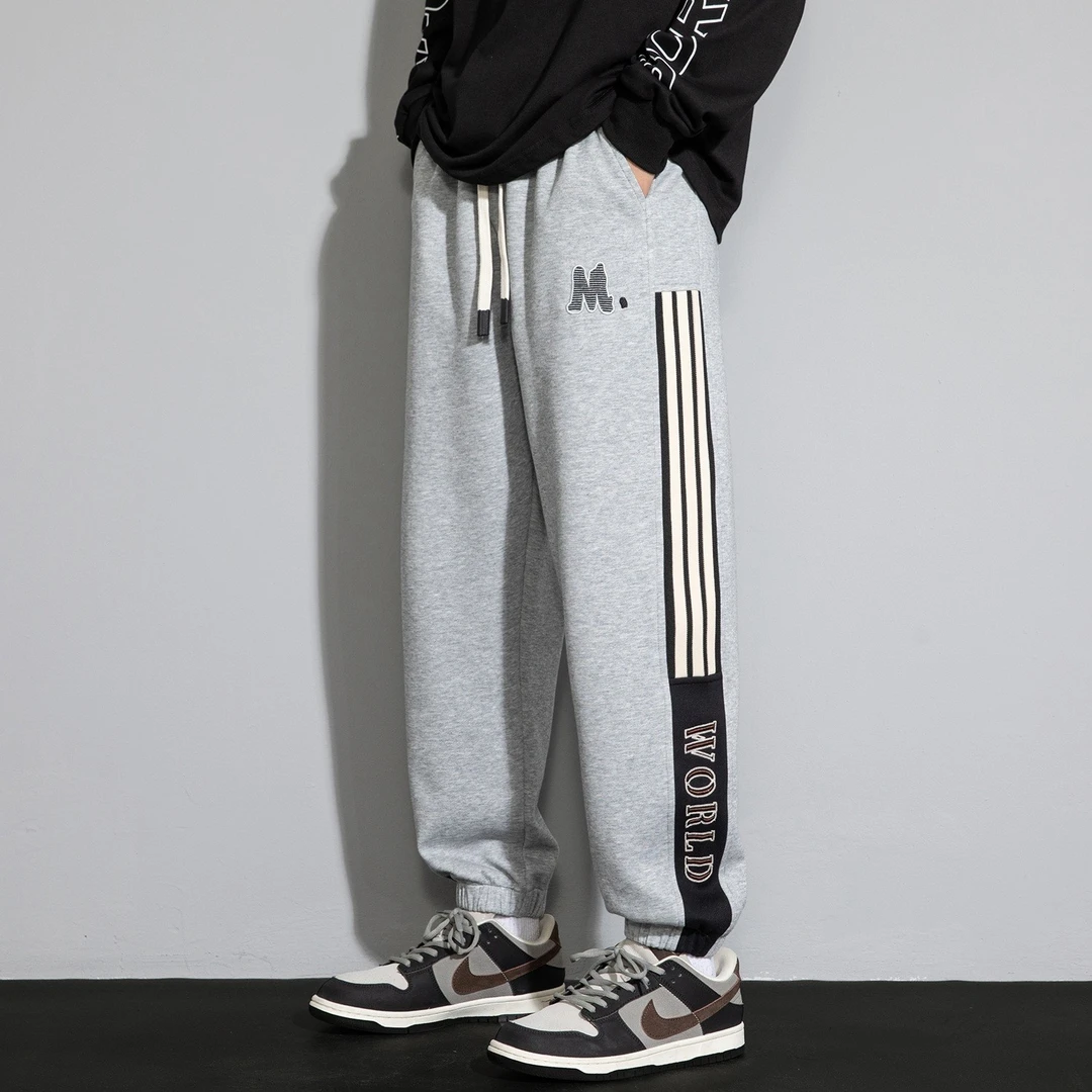 《春季新款》迈特优休闲裤男宽松束脚拼接卫裤潮流运动长裤子9181